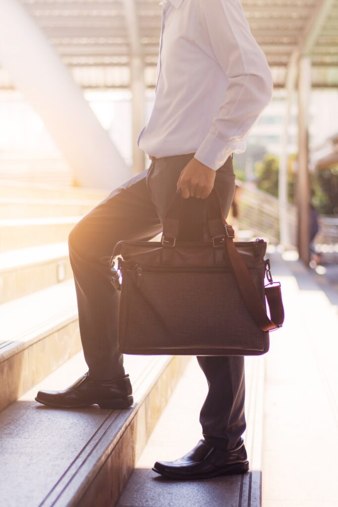 business man walking up stairs