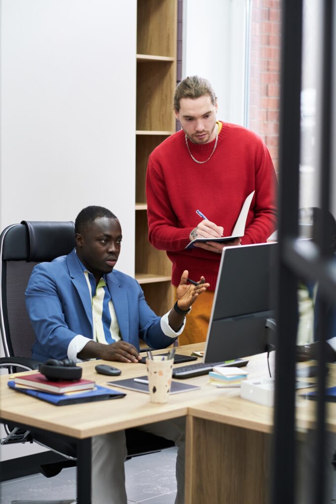 Businessman asking advice with director